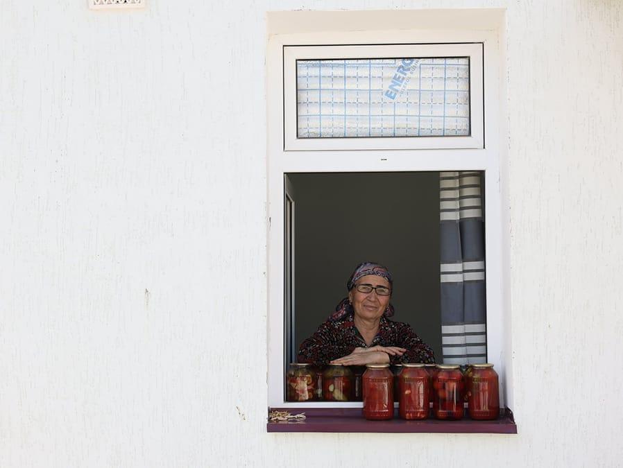 Woman looking out window